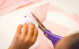 a person holding a pen