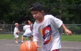 a boy playing basketball