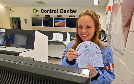 a person holding a cd