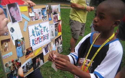 a boy holding a picture