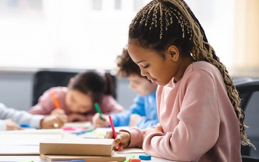 a few children studying together