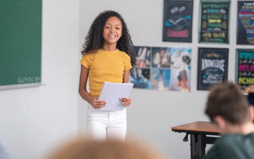 a person holding a paper