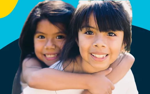 a couple of girls hugging