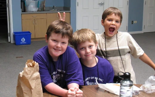 a group of boys posing for a picture