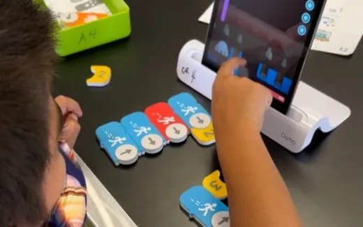 a person holding a tablet