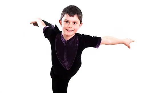 a boy with his arms out