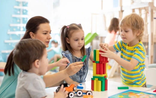 a group of children playing with toys
