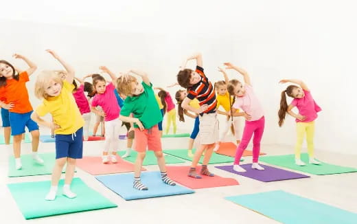 a group of children exercising