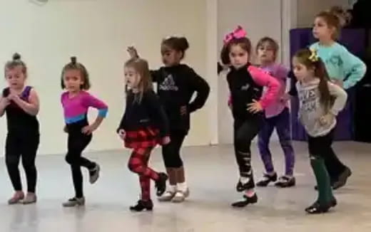 a group of children dancing