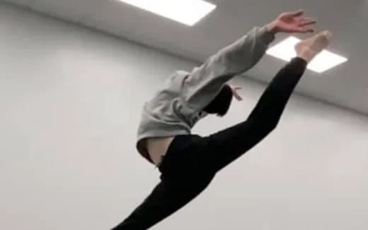 a person doing a handstand