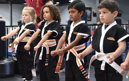 a group of children in matching uniforms