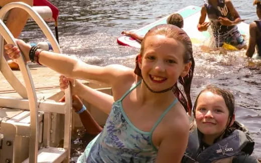 a group of children on a boat
