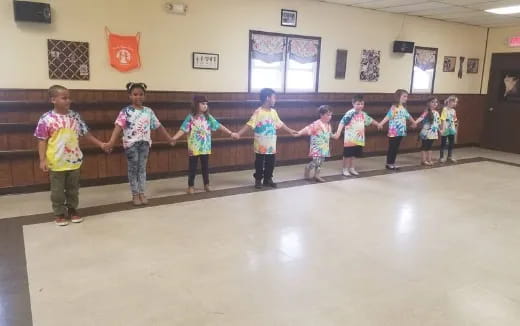 a group of children dancing