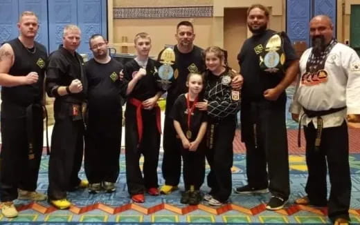 a group of people posing for a photo