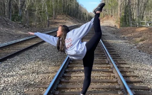 a man standing on train tracks