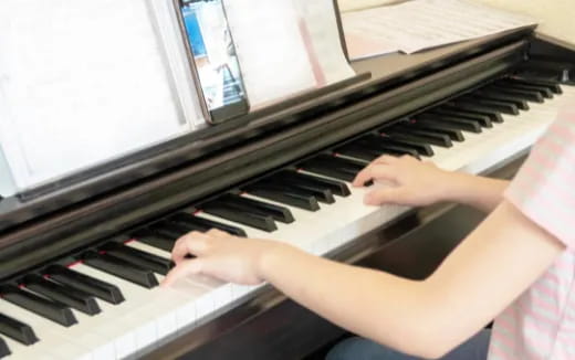 a person playing a piano