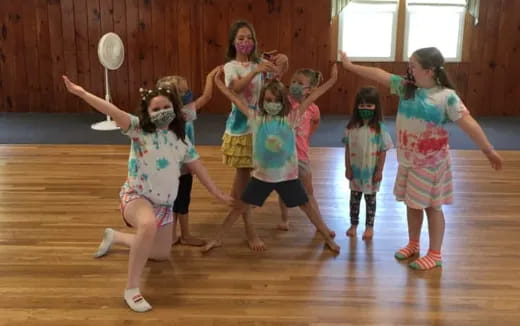 a group of children dancing