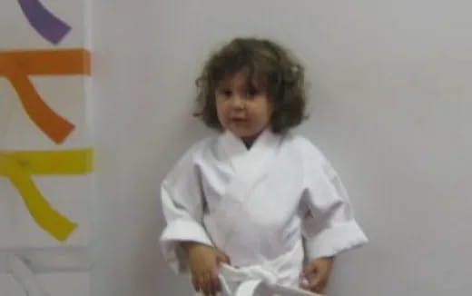 a child in a white shirt