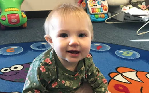 a baby in a highchair