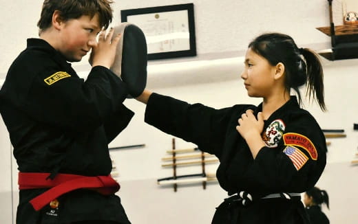a man and a woman in uniform