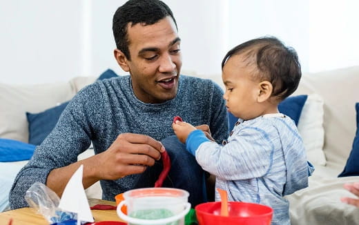 a person holding a baby