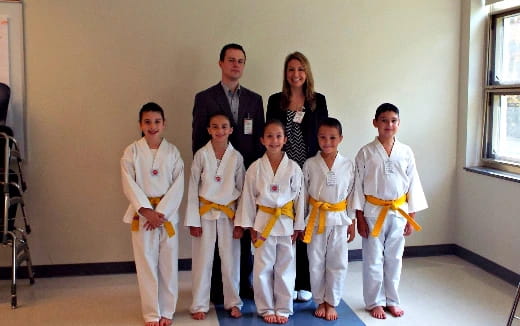 a group of people posing for a photo