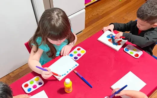 children sitting at a table