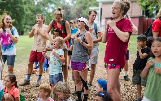 a group of people standing outside