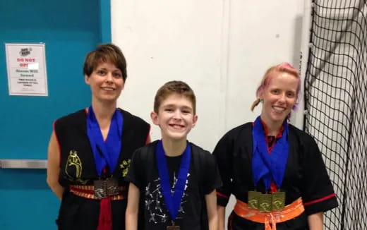 a group of people posing for the camera