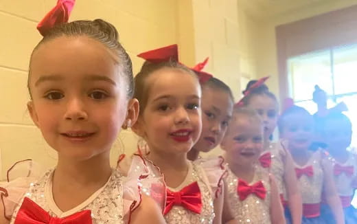 a group of children in clothing