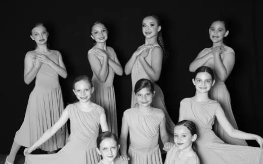 a group of people posing for the camera