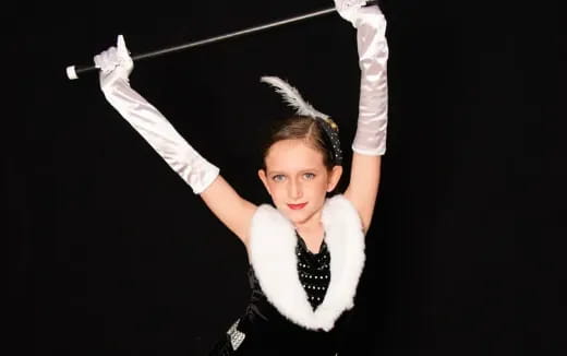 a person with the arms up