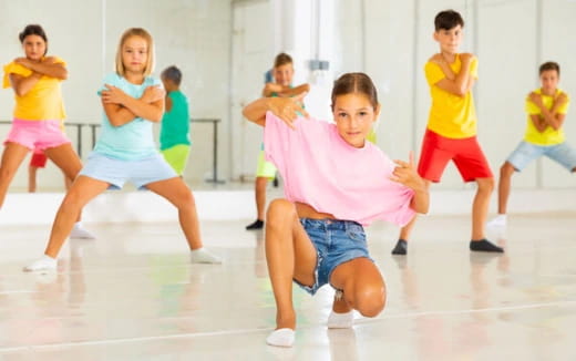 a group of children dancing