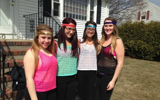 a group of women posing for a photo