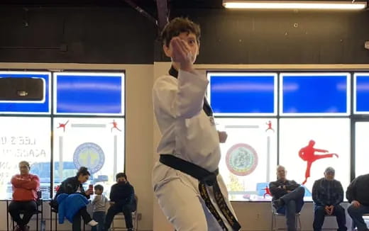 a person holding a skateboard