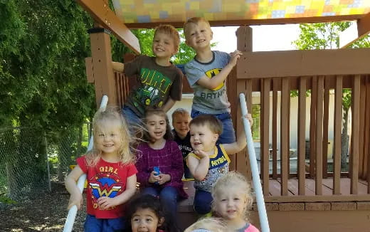 a group of children posing for a photo