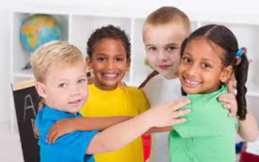 a group of children smiling