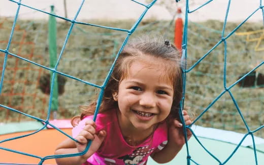 a girl in a swing