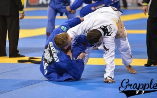 a group of people in a martial arts ring