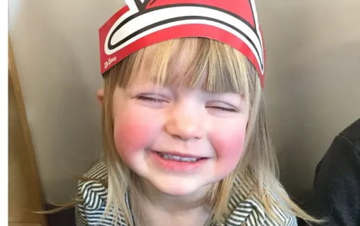 a girl with a red hat