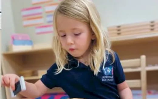 a young girl playing video games