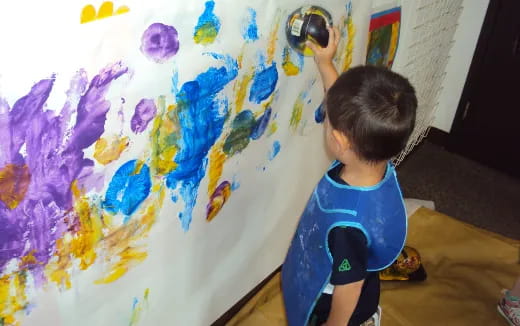 a child painting a picture