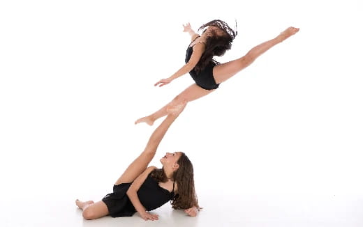 a couple of women dancing