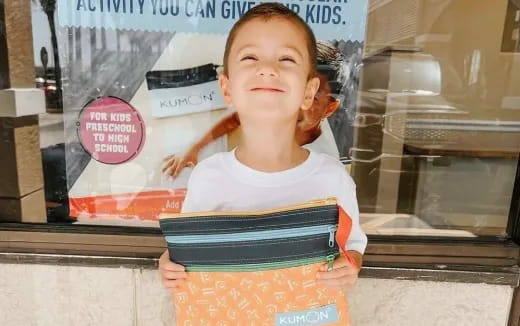 a child wearing a apron