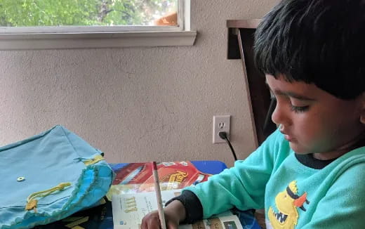 a young boy painting