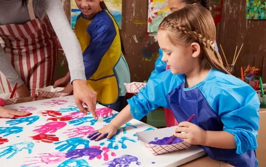 a young girl painting
