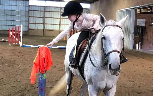 a man riding a horse