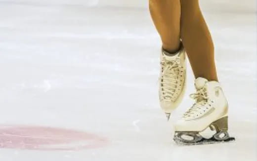 a person wearing ice skates