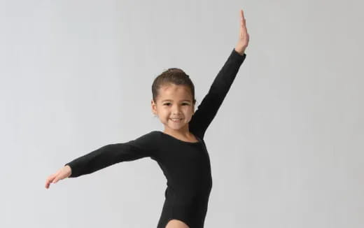 a man with his arms up