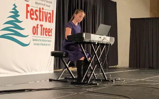a person playing a piano